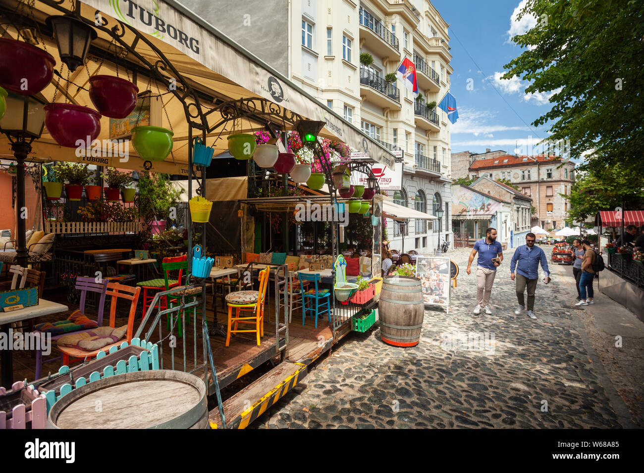 BELGRADE, SERBIA – JULY 07: Visitors enjoy cafes in Skadarlija, Belgrade's bohemian quarter on 07 July 2019 in Belgrade, Serbia. Stock Photo