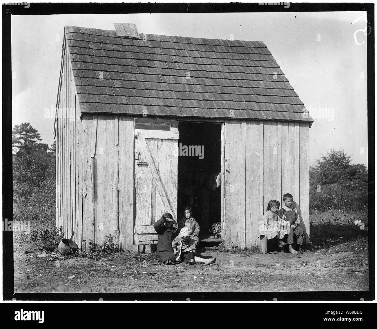 Small shack on Forsythe's Bog occupied by DeMarco family, 10 in the family living in this one room. Room is 10 feet x 11 ft. x 5 1/2 ft. high and gable attic above. Wooden toilets near at hand and bushes used as such, gave forth offensive odors. Turkeytown, N.J. Stock Photo
