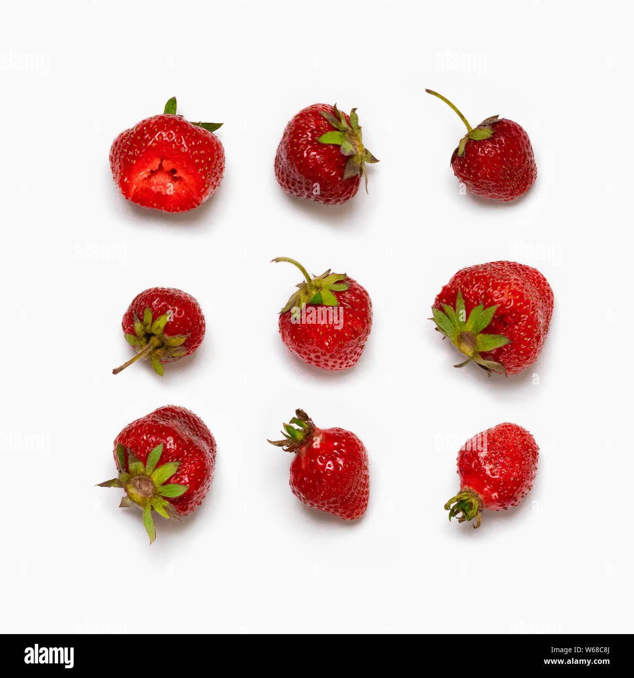 Strawberry slices as seamless pattern isolated on white background Stock Photo
