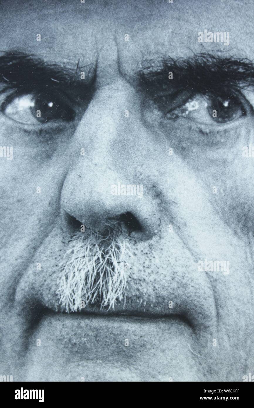 Fine black and white art photography portrait of a cautious man from the 1970s. Stock Photo