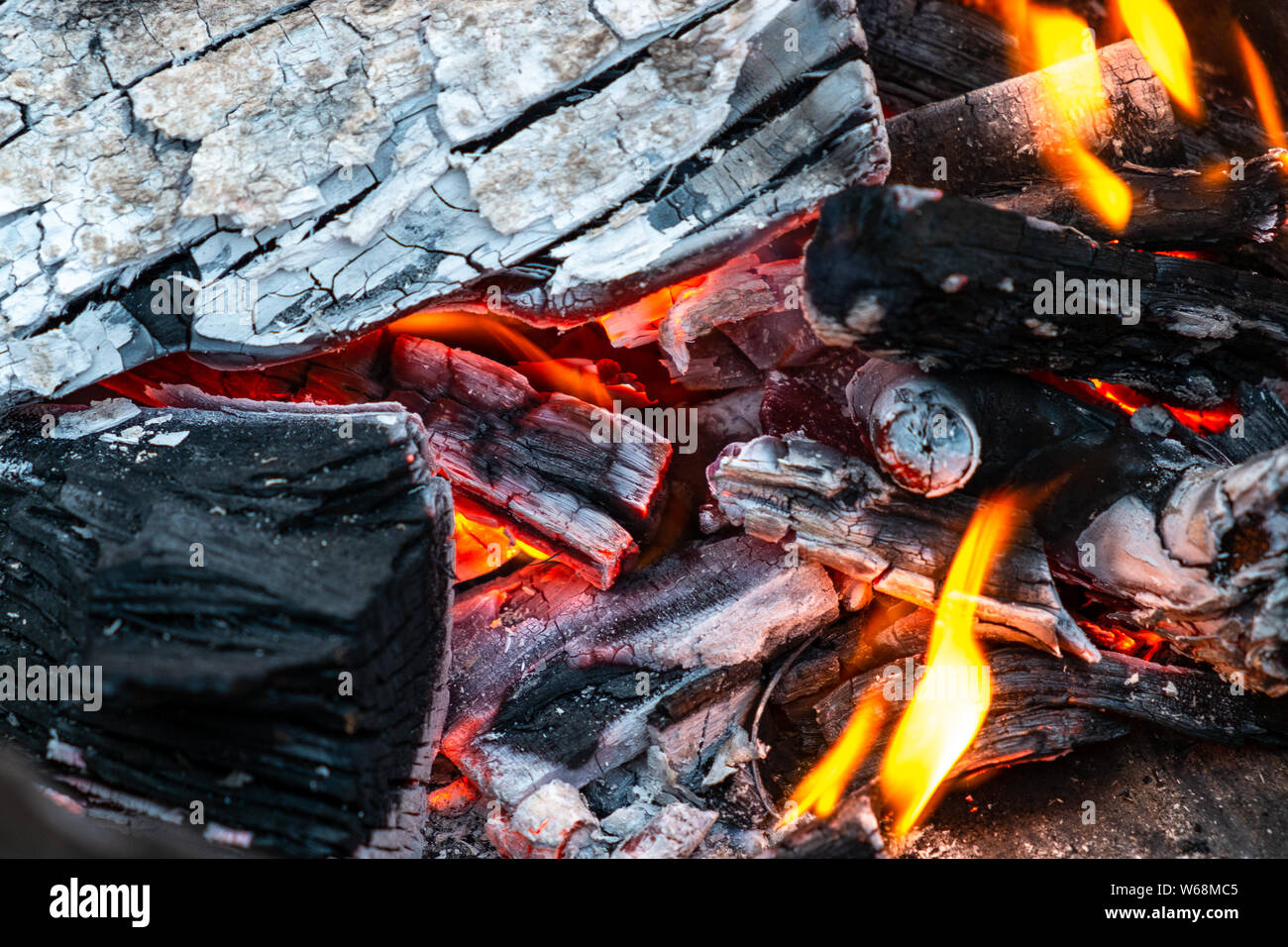 Closeup Of Burning And Smoldering Firewood Close Up Of Burning