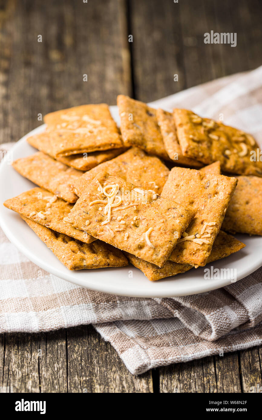 Salted crispy crackers on plate Stock Photo - Alamy