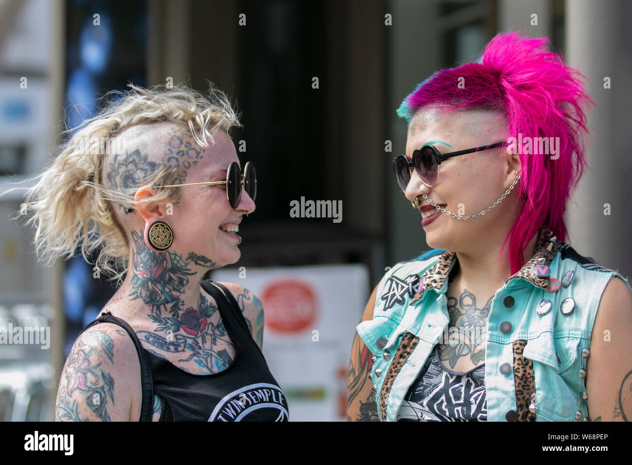 Female punks with dyed hair in Blackpool, Lancashire, UK. 31st July, 2019.  Bobbie from Texas a Rock Band member at the Rebellion Festival world's  largest punk festival in Blackpool. At the beginning