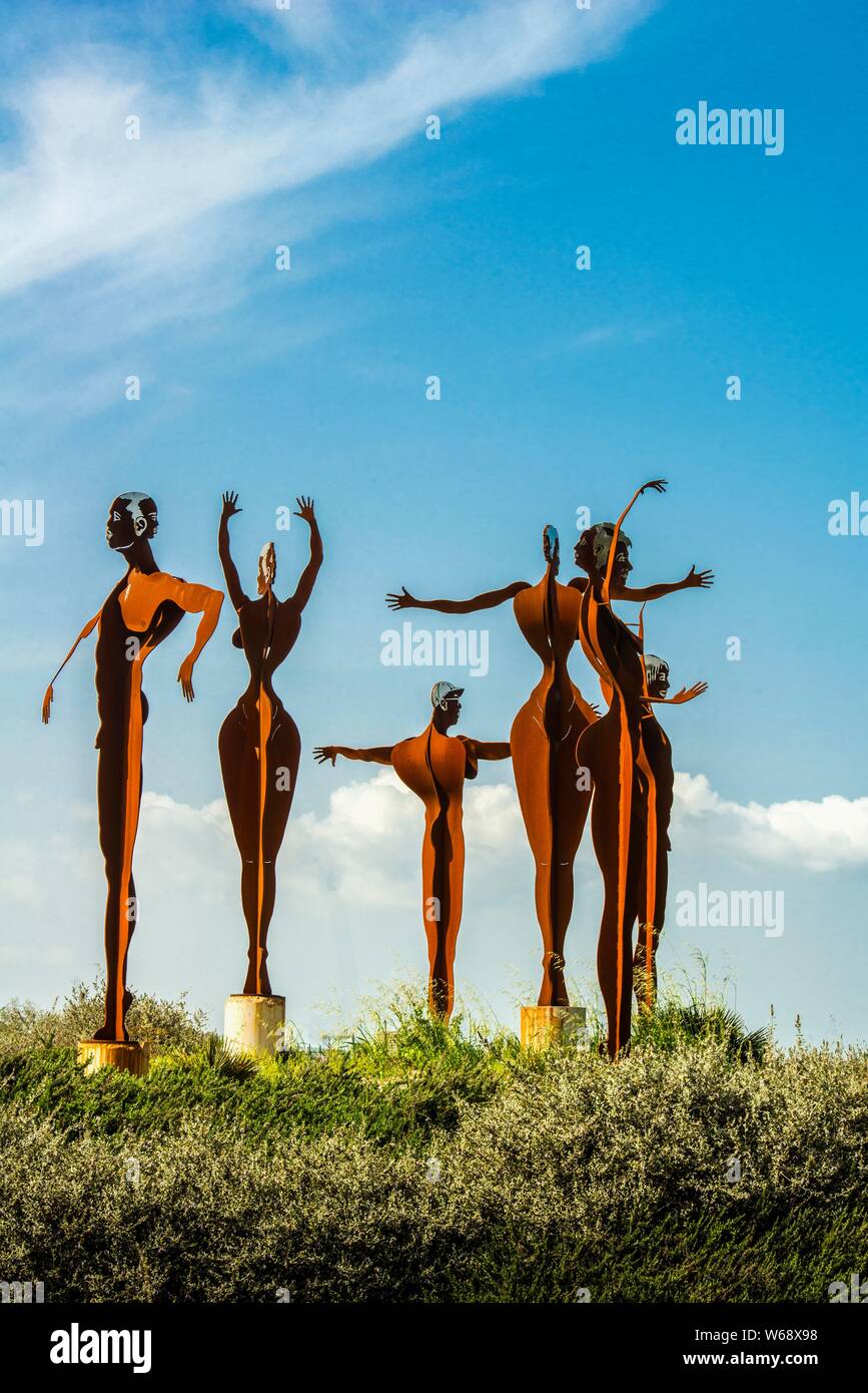 Mallorca, Campos, 04-29-2018. Sculpture of dancing figures by Miguel Sarasate on a trafic circle near Campos Stock Photo