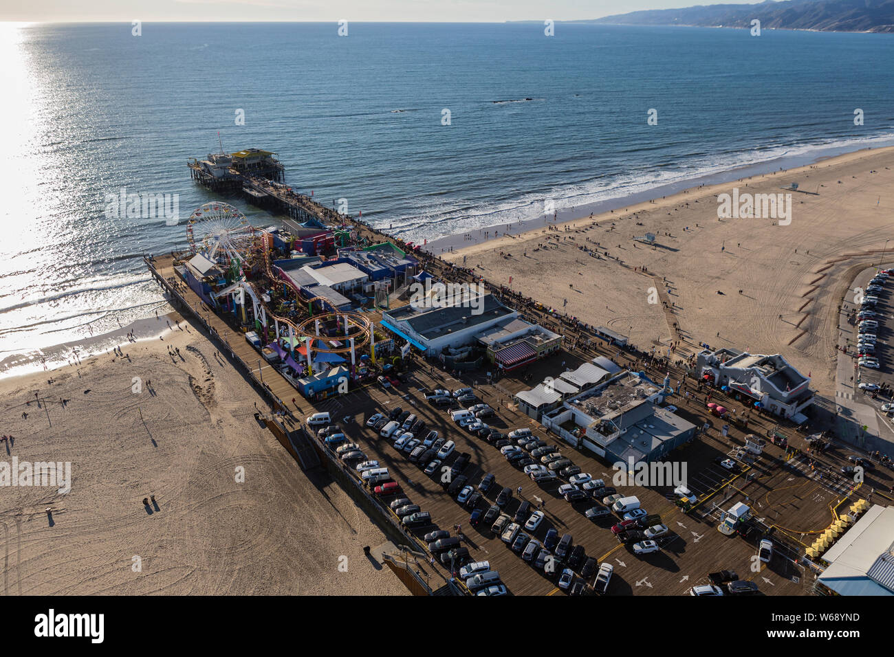 Santa Monica, California, USA - December 17, 2016:  Afternoon aerial view of famous Santa Monica Pier and beach on the Los Angeles County coast. Stock Photo