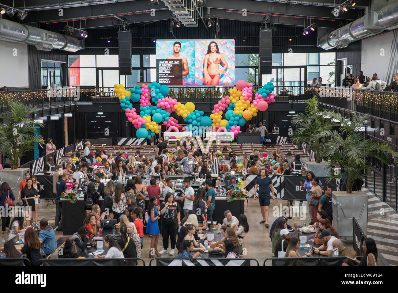 The atmosphere at the Love Island finale screening at Boxpark Wembley in London. Stock Photo