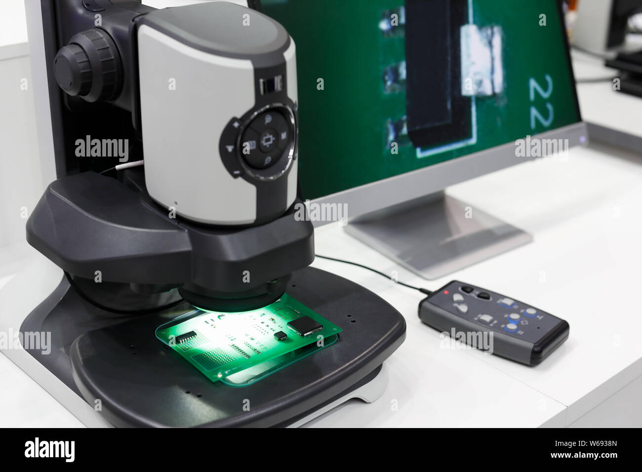 Technical inspection workstation with a digital microscope for advanced inspection of printed circuit boards (PCB). Selective focus. Stock Photo