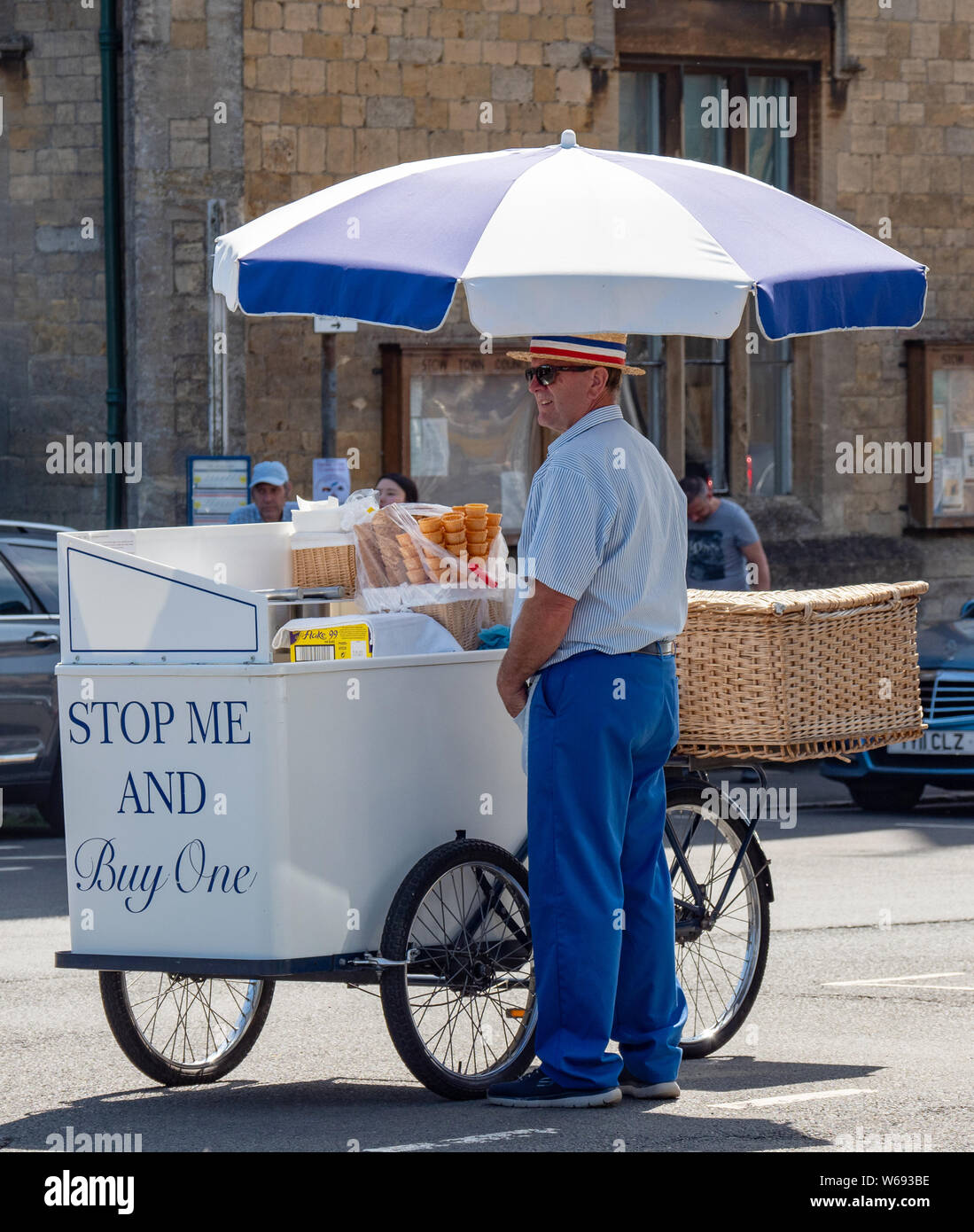 Stop me and buy one - An Ice Cream seller in Stow on the Wold, Gloucestershire, England, UK. Stock Photo