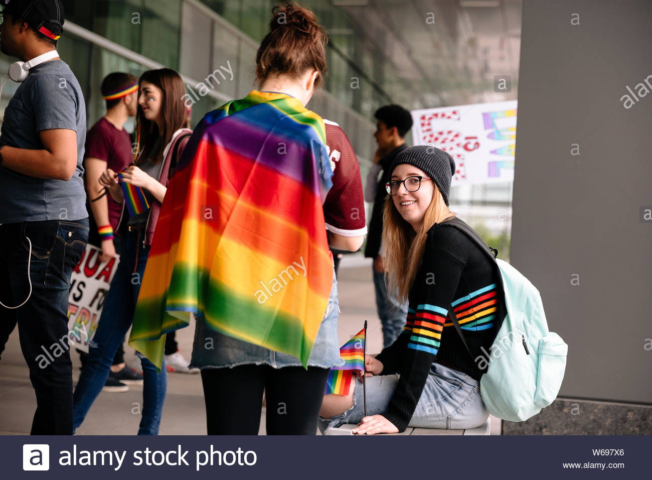 Asian lady wearing blue jean jacket or denim shirt and holding rainbow  color flag, symbol of LGBT pride month celebrate annual in June social of  gay Stock Photo - Alamy