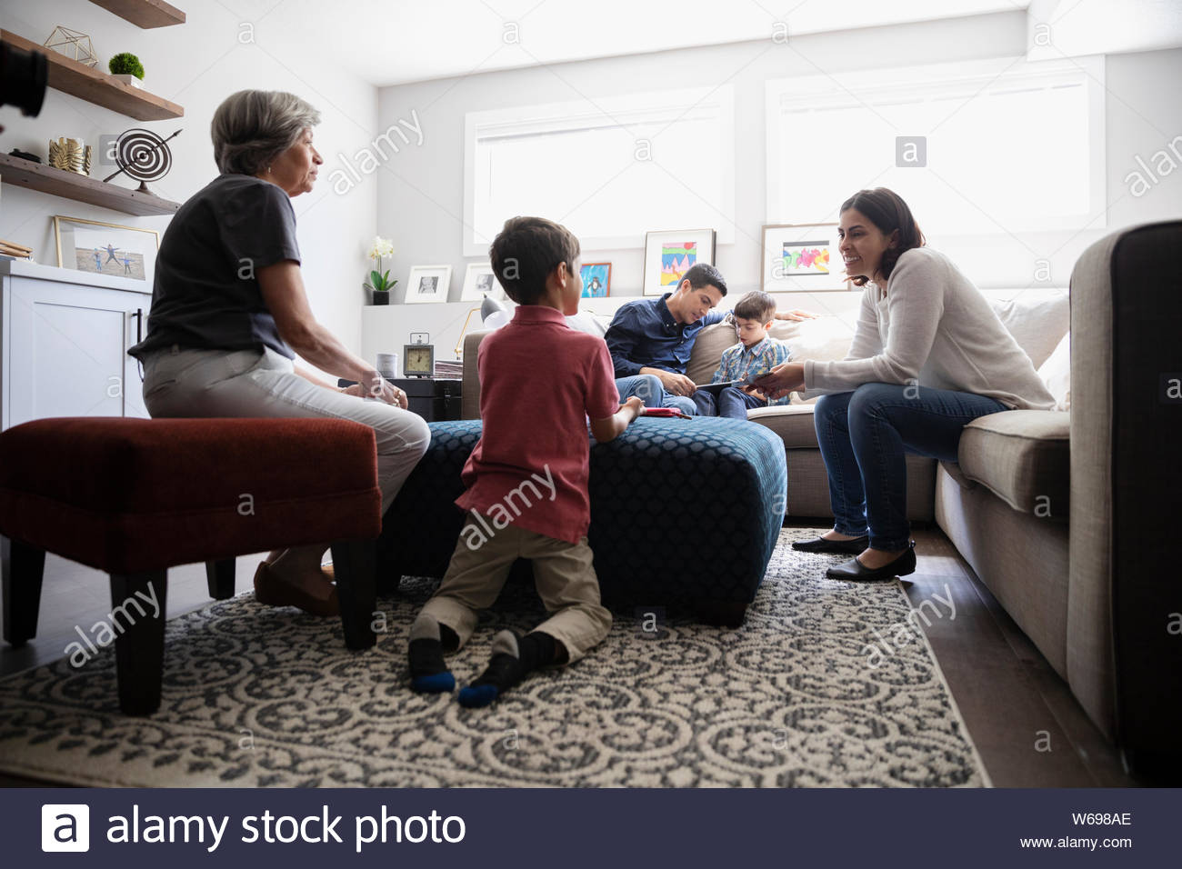 Multi-generation family in living room Stock Photo