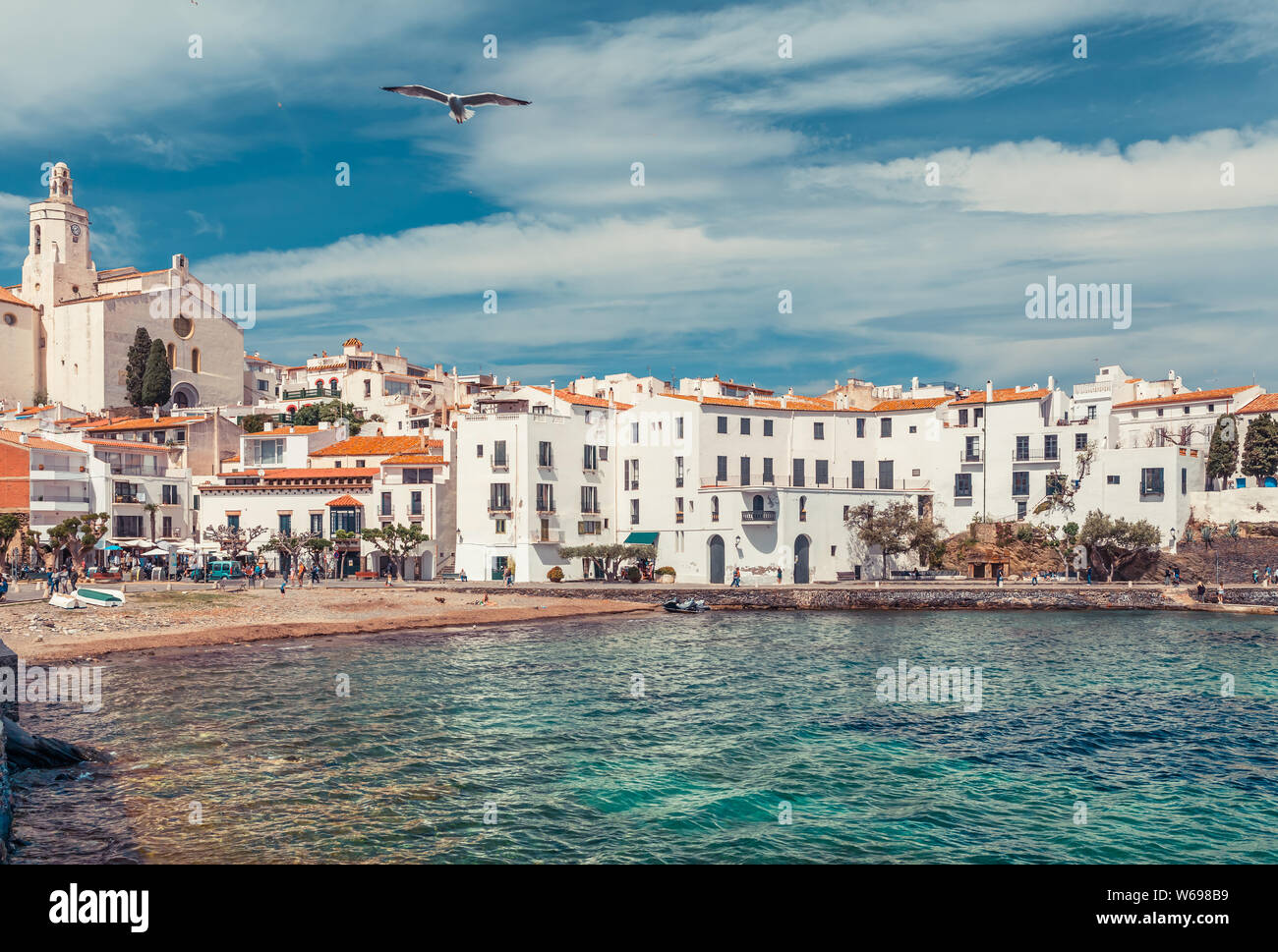 Sea landscape with Cadaques, Catalonia, Spain near of Barcelona. Scenic old town with nice beach and clear blue water in bay. Famous tourist destinati Stock Photo