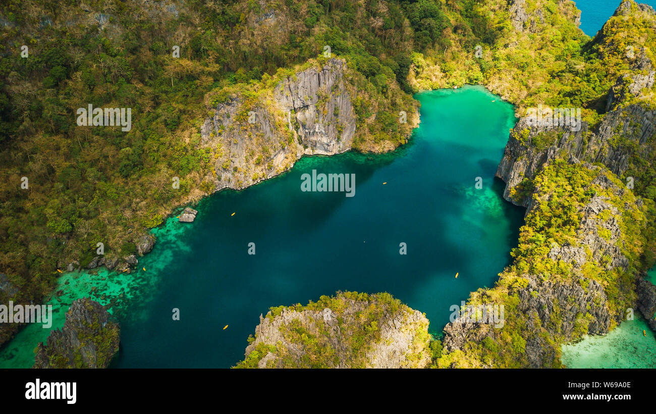 Aerial view of beautiful lagoons and limestone cliffs of El Nido
