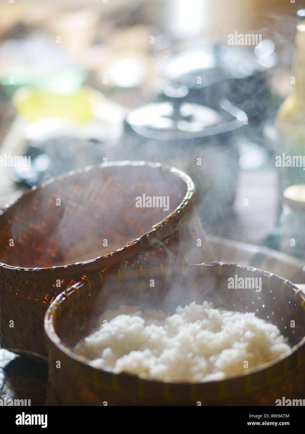 Warm rice in a bamboo basket. Stock Photo