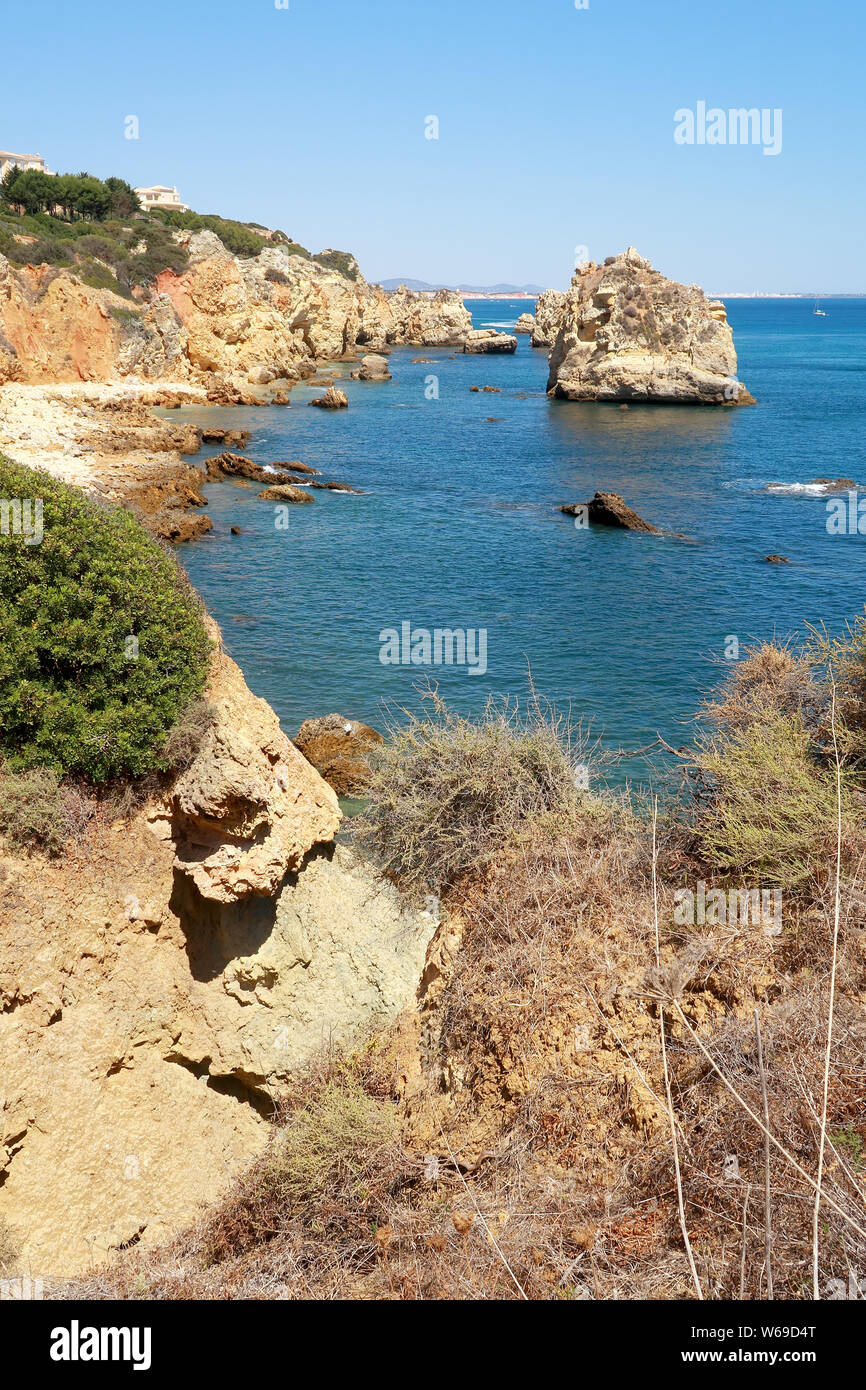 The rocky cliffs and jagged rocks overlooking the Atlantic Ocean near ...