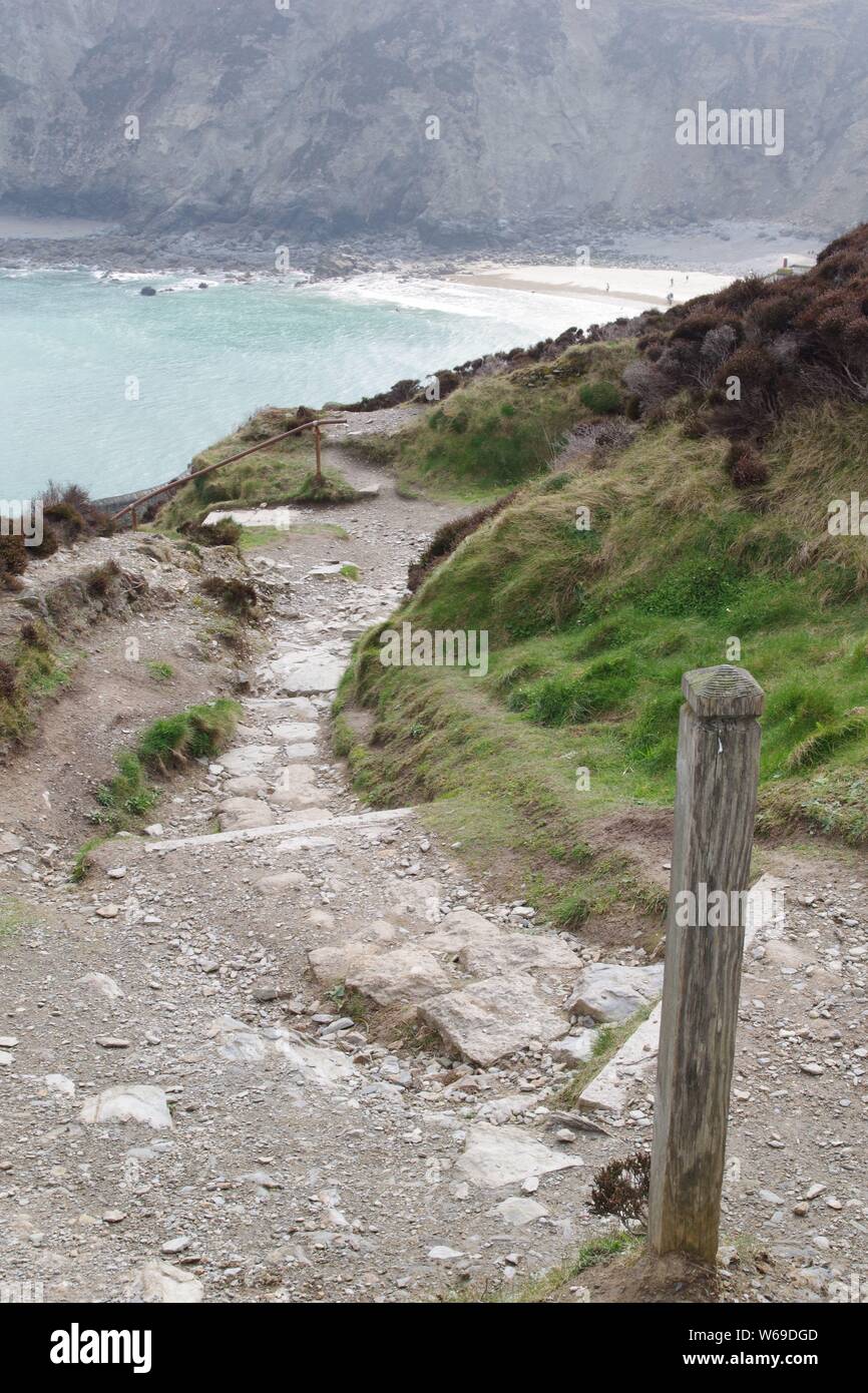 Granite Flagstone of the South West Coastal Path around St Agnes Head on a Spring Day. Cornwall, UK. Stock Photo