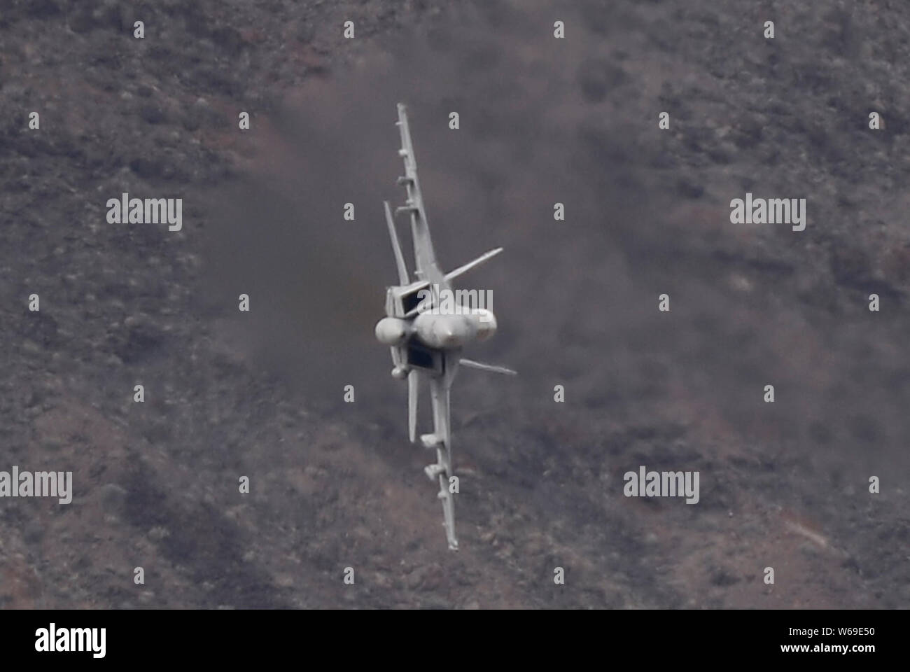 F-18 makes a high speed pass up to 500 mph through StarWars Canyon the Jedi Transition in Panamint Spring/ Death Valley back in March 2019. Today a Navy F-18 jet crash down canyon from the Farther Crawley Overlook with 7 people hurt and the pilot still missing, Death Valley CA. July 31, 2019.Photo by Gene Blevins/ZumaPress. Credit: Gene Blevins/ZUMA Wire/Alamy Live News Stock Photo