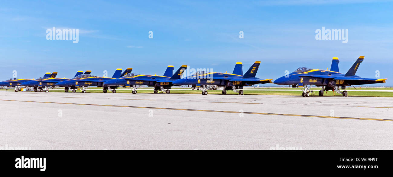 The U.S. Navy Blue Angels squadron is lined up on the runway at Burke Lakefront Airport in Cleveland, Ohio, during the 2018 Cleveland Air Show. Stock Photo