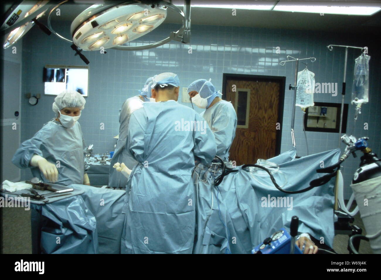 Orthopedic surgeons during knee replacement procedures in a local New