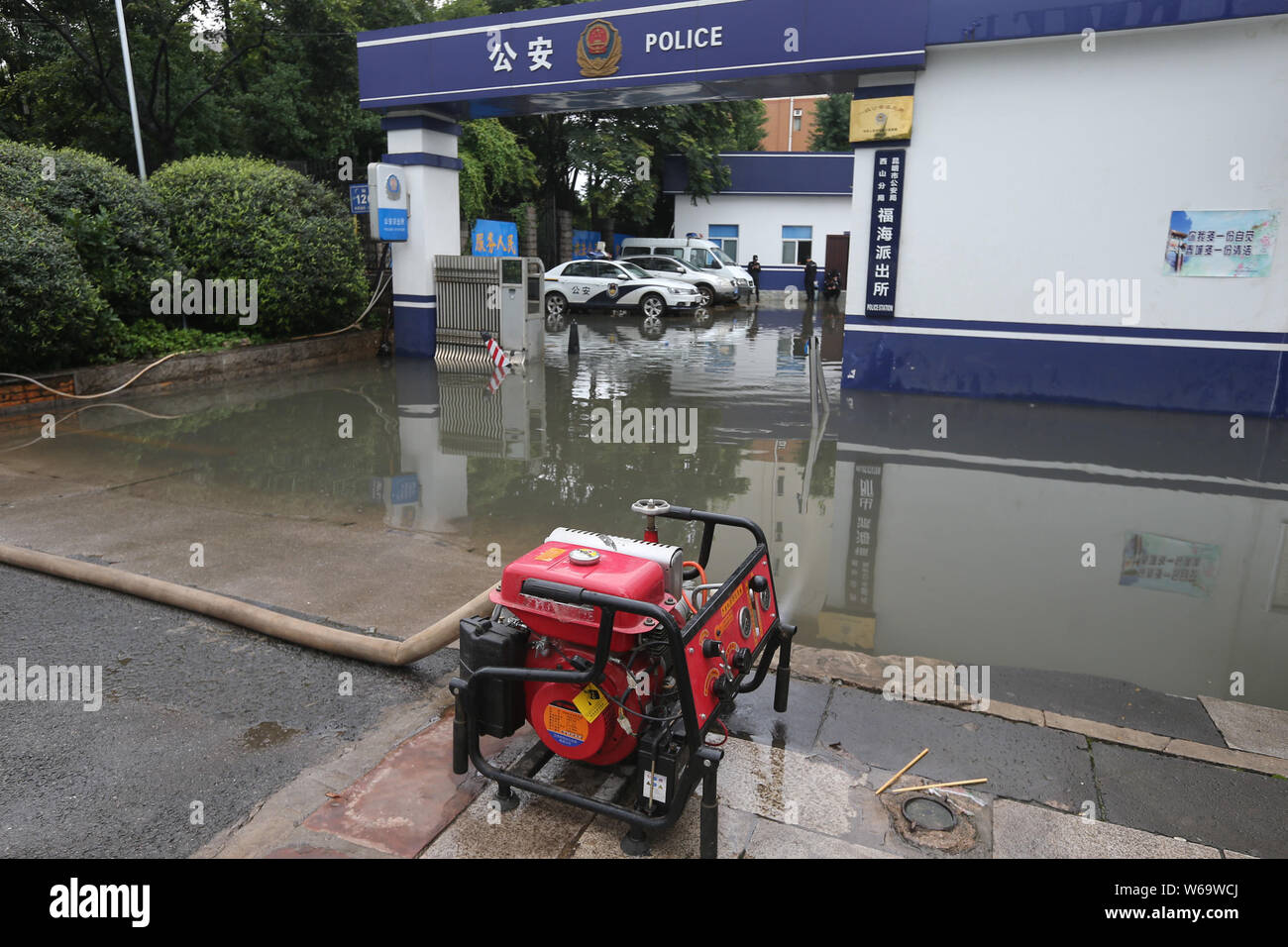 View of the waterlogged Fuhai Police Station after heavy rains in Kunming city, southwest China's Yunnan province, 25 June 2018.     The Fuhai Police Stock Photo