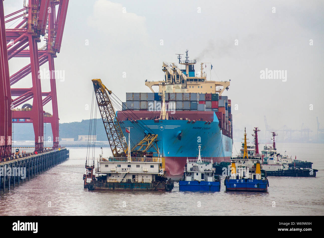 A cargo ship loaded with 1,690 twentyfoot equivalent units (TEUs) is