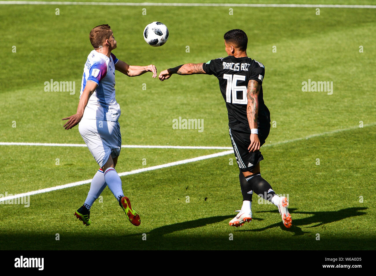 Marcos Rojo of Argentina, right, challenges a player of Iceland in their Group D match during the 2018 FIFA World Cup in Moscow, Russia, 16 June 2018. Stock Photo