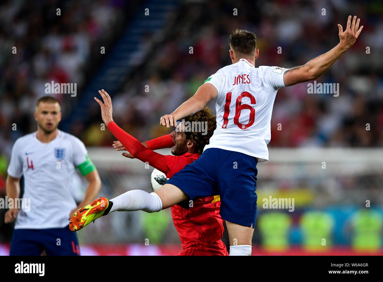 Phil Jones of England, right, challenges a player of Belgium in their Group G match during the 2018 FIFA World Cup in Kaliningrad, Russia, 28 June 201 Stock Photo