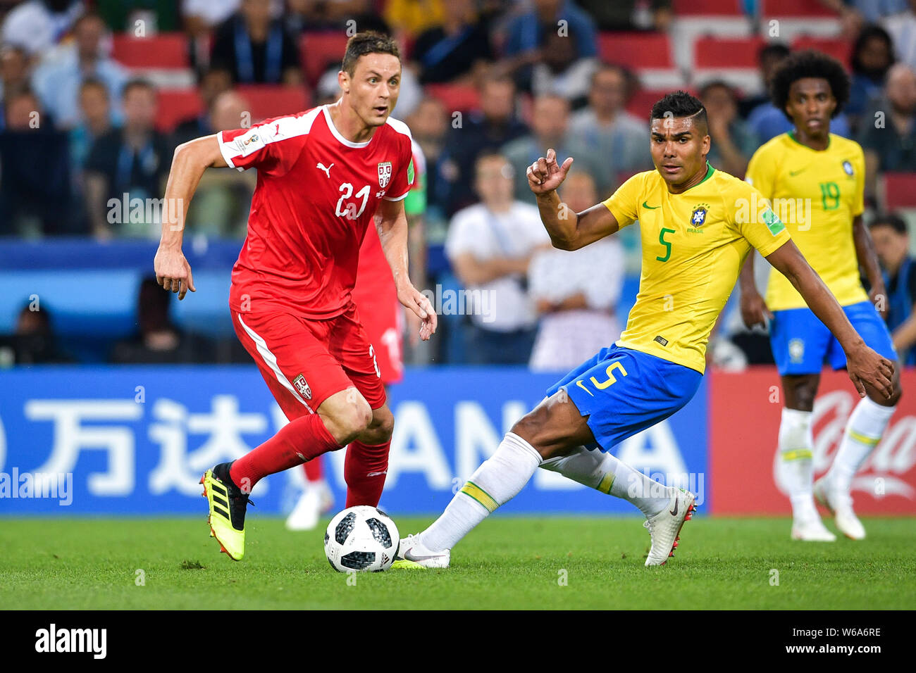Nemanja Matic of Serbia, left, challenges Casemiro of Brazil in their Group E match during the FIFA World Cup 2018 in Moscow, Russia, 27 June 2018. Stock Photo