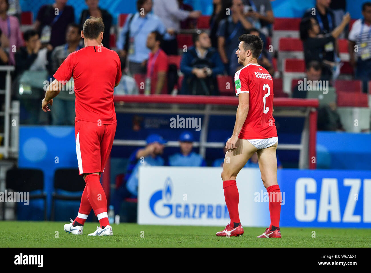 Antonio Rukavina of Serbia, right, who lost his shorts walks towards the sideline after their Group E match against Brazil during the FIFA World Cup 2 Stock Photo