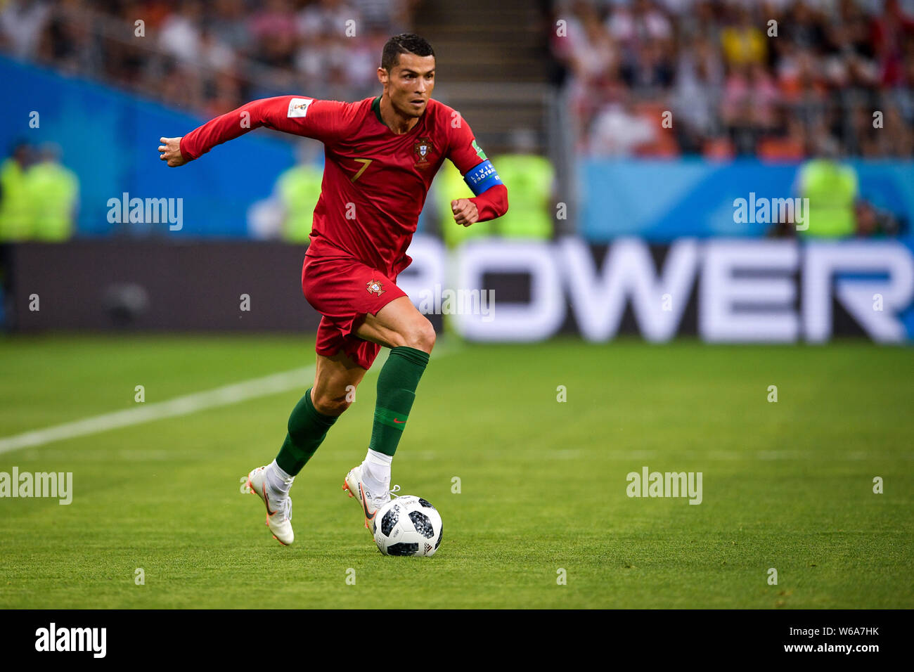 Cristiano Ronaldo of Portugal dribbles against Iran in their