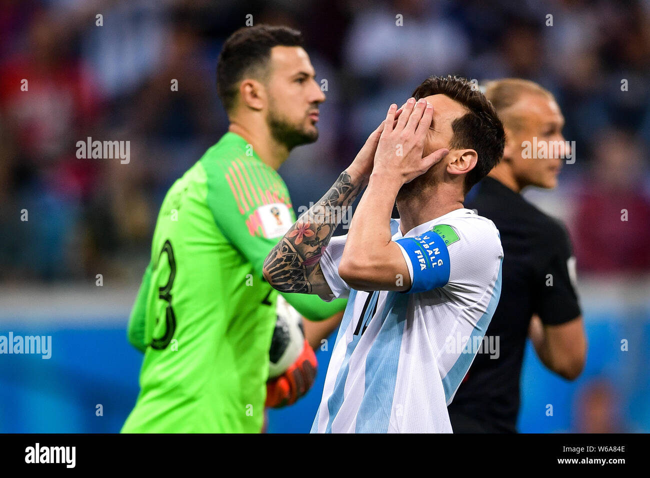 Lionel Messi of Argentina, right, reacts after missing a goal in the Group D match against Croatia during the 2018 FIFA World Cup in Nizhny Novgorod, Stock Photo