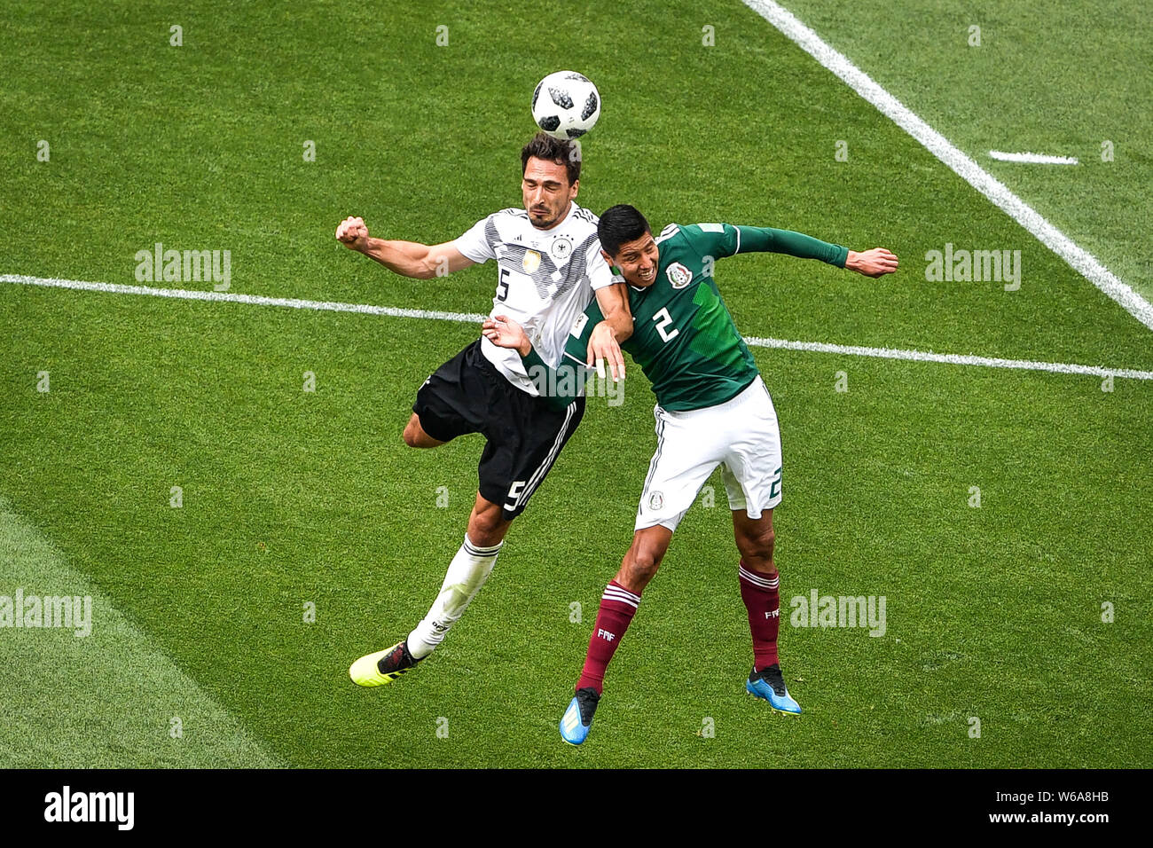 Mats Hummels of Germany, left, challenges Hugo Ayala of Mexico in their Group F match during the FIFA World Cup 2018 in Moscow, Russia, 17 June 2018. Stock Photo
