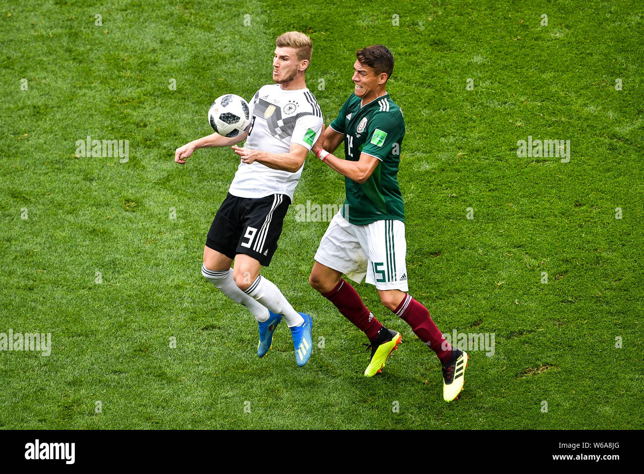 Hector Moreno of Mexico, right, challenges Timo Werner of Germany in their Group F match during the 2018 FIFA World Cup in Moscow, Russia, 17 June 201 Stock Photo
