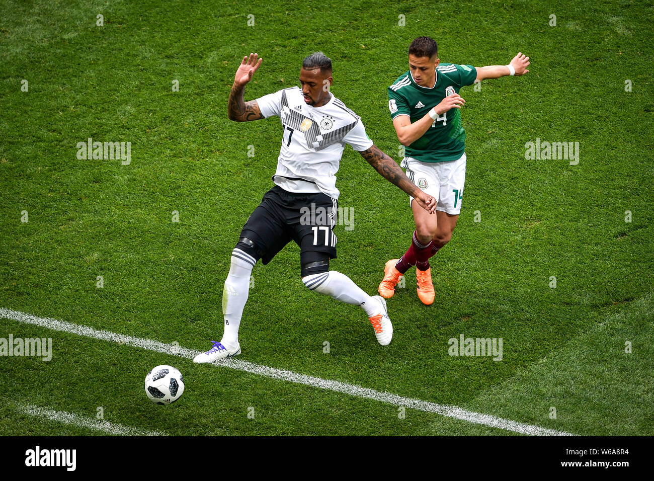 Javier Hernandez of Mexico, right, challenges Jerome Boateng of Germany in their Group F match during the 2018 FIFA World Cup in Moscow, Russia, 17 Ju Stock Photo