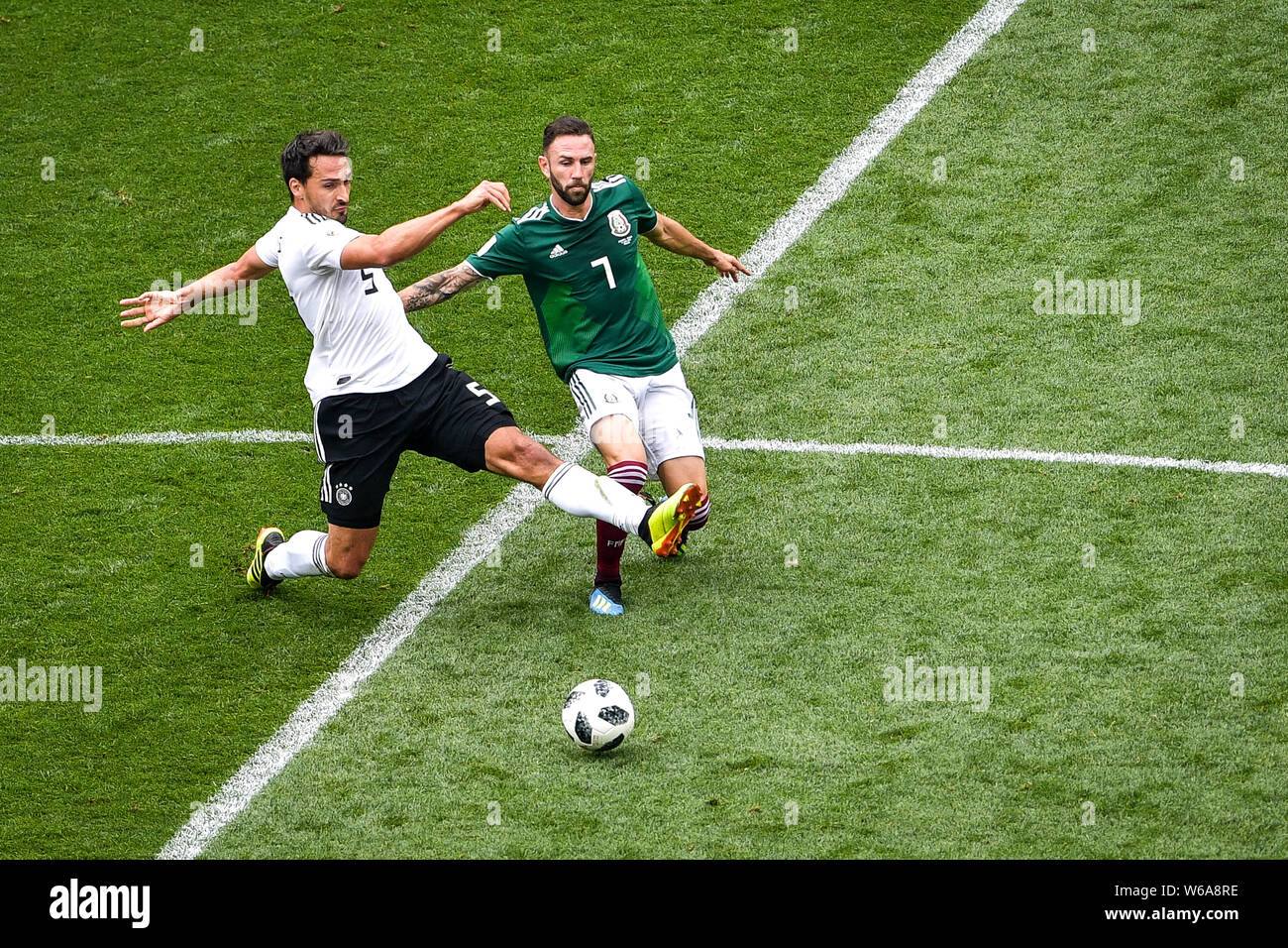 Mats Hummels of Germany, left, challenges Miguel Layun of Mexico in their Group F match during the FIFA World Cup 2018 in Moscow, Russia, 17 June 2018 Stock Photo