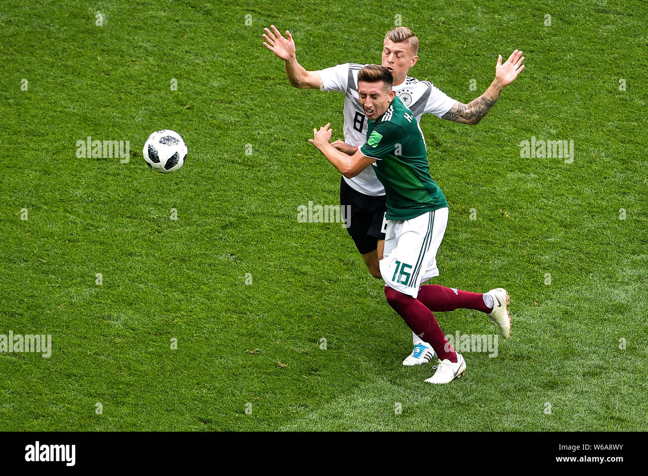 Hector Herrera of Mexico, right, challenges Toni Kroos of Germany in their Group F match during the 2018 FIFA World Cup in Moscow, Russia, 17 June 201 Stock Photo