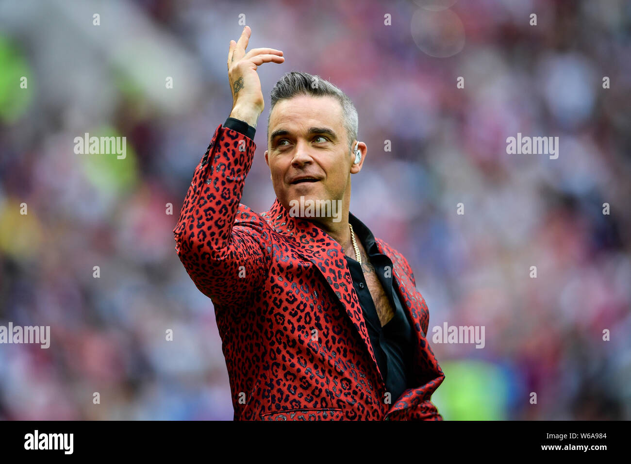 English singer Robbie Williams performs during the opening ceremony of the FIFA World Cup 2018 Russia in Moscow, Russia, 14 June 2018. Stock Photo