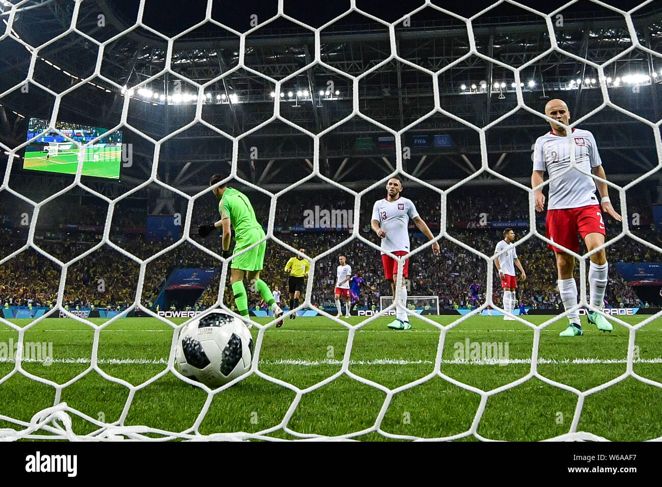 (From left) Goalkeeper Wojciech Szczesny, Maciej Rybus and Michal Pazdan of Poland react after Juan Cuadrado of Colombia scored a goal in their Group Stock Photo