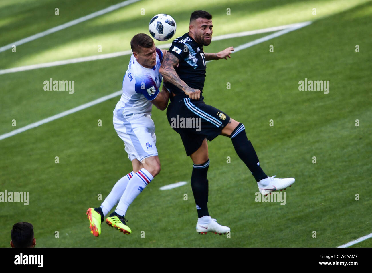 Nicolas Otamendi of Argentina, right, challenges Alfred Finnbogason of Iceland in their Group D match during the FIFA World Cup 2018 in Moscow, Russia Stock Photo