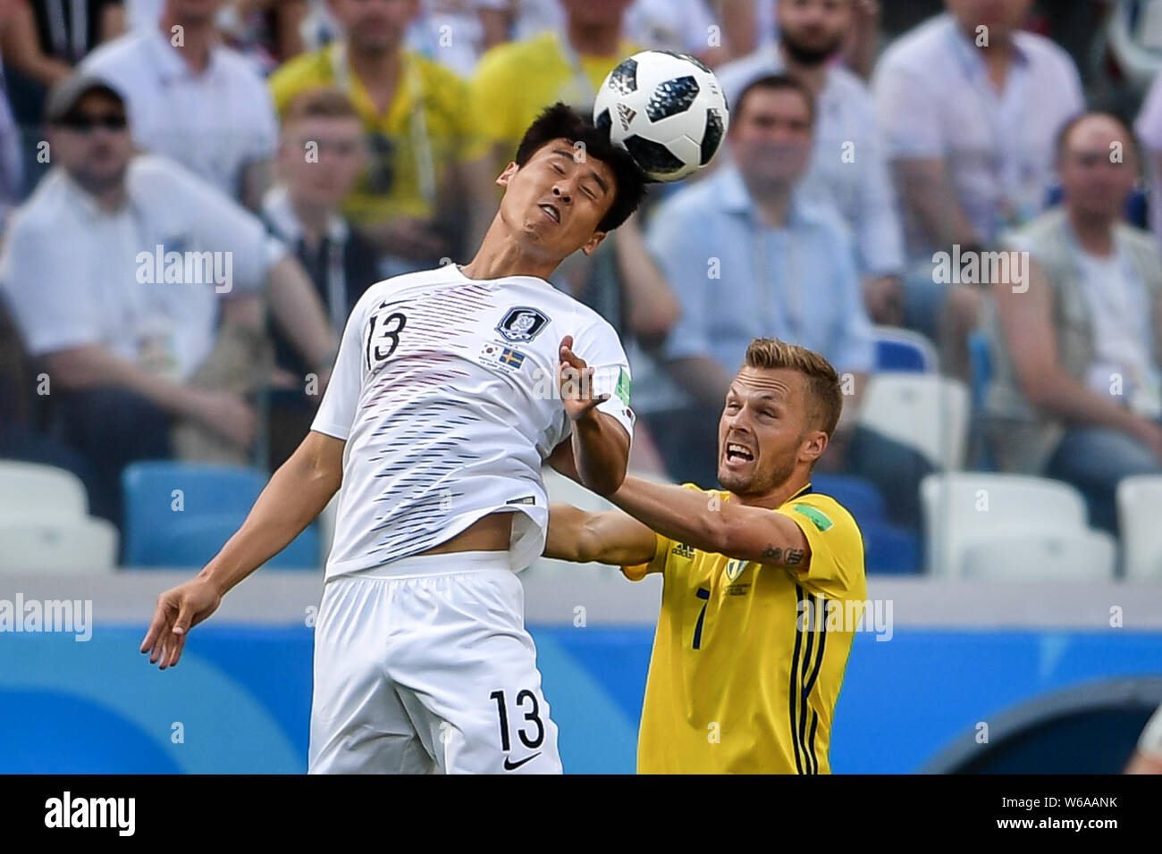 Koo Ja-cheol of South Korea, left, challenges Sebastian Larsson of Sweden in their Group F match during the FIFA World Cup 2018 in Nizhny Novgorod, Ru Stock Photo