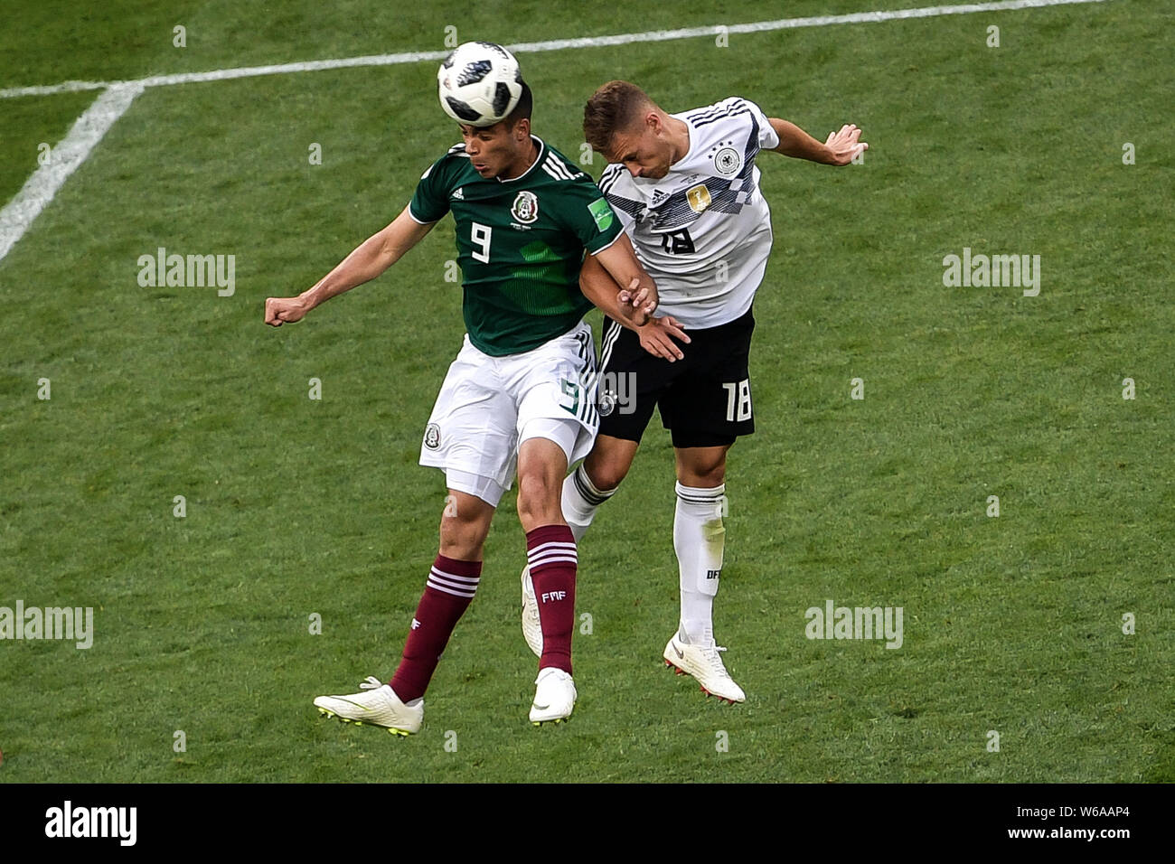 Joshua Kimmich of Germany, right, challenges Raul Jimenez of Mexico in their Group F match during the FIFA World Cup 2018 in Moscow, Russia, 17 June 2 Stock Photo