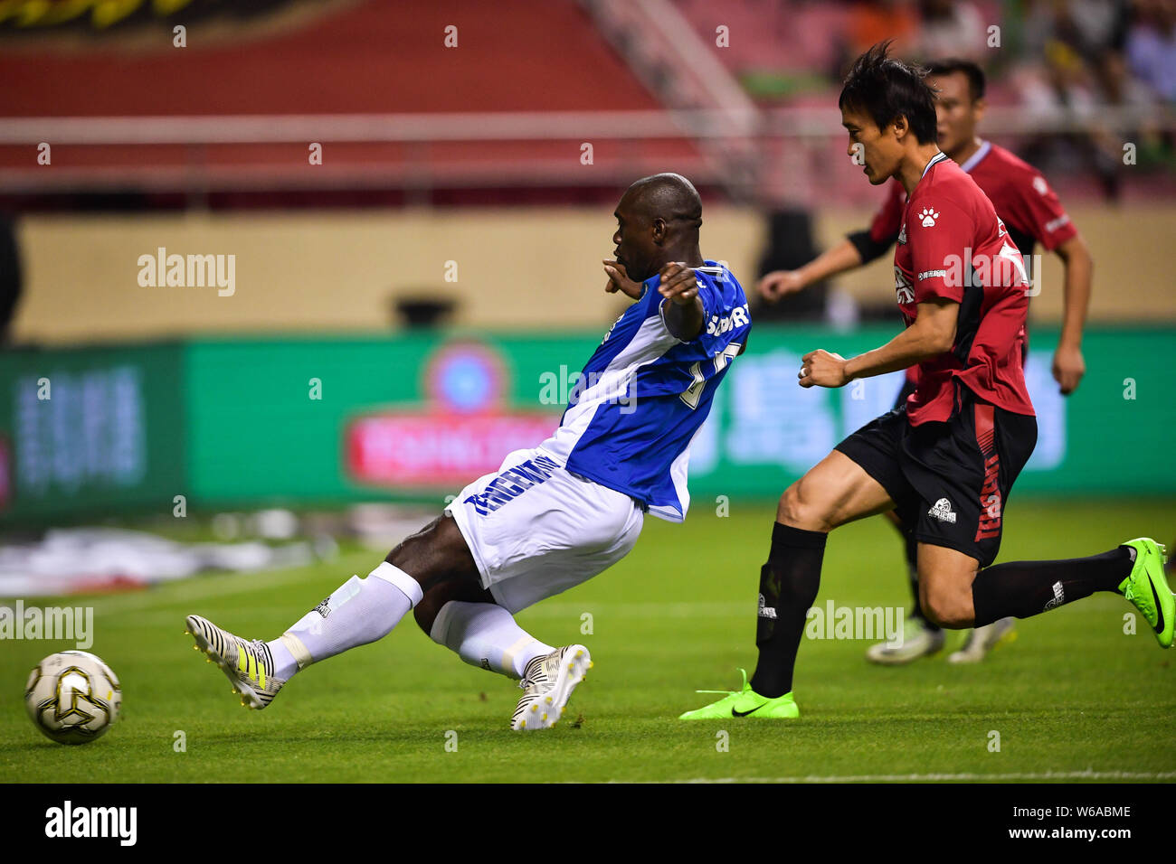 Dutch retired football player Clarence Seedorf of International Legends kicks the ball to shoot against Chinese Celebrity during the 2018 Super Pengui Stock Photo