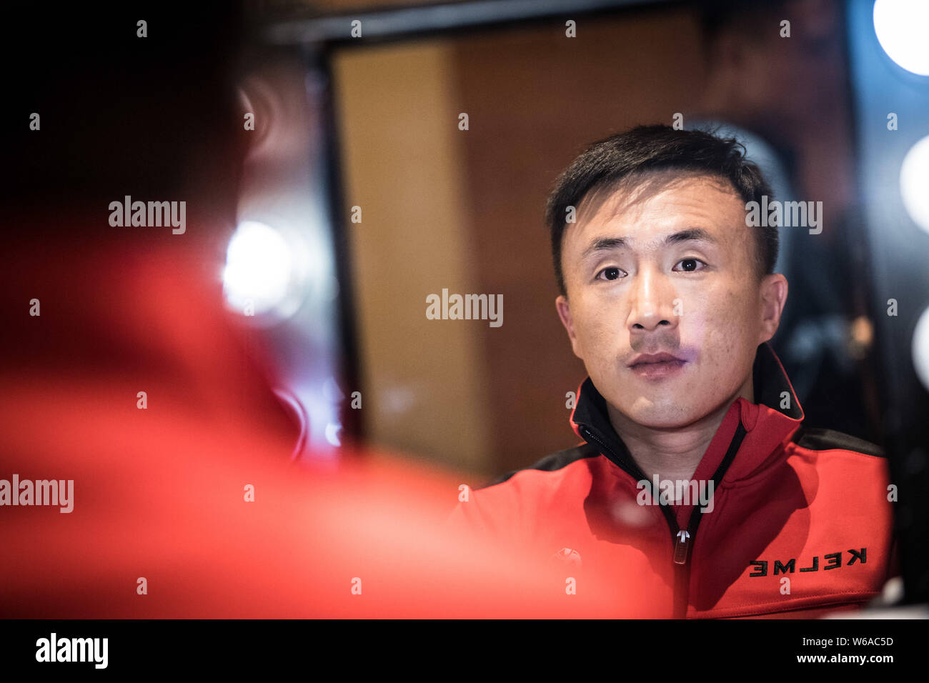 **EXCLUSIVE**Chinese football player Wang Yongpo of Tianjin Quanjian F.C. prepares for the official portrait filming session of the 2018 Super Penguin Stock Photo