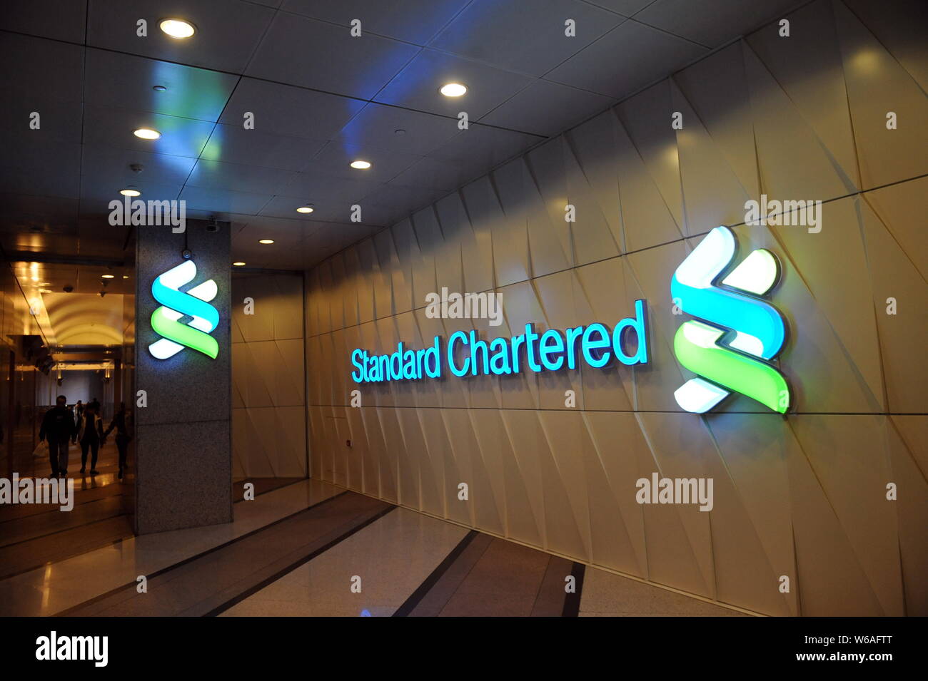 File View Of A Signboard Of London Listed Standard Chartered Bank In File View Of A Signboard Of London Listed Standard Chartered Bank In