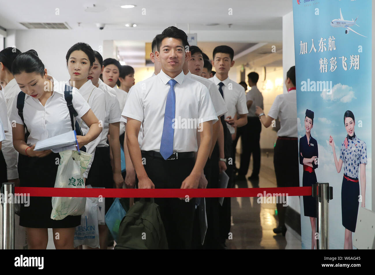 Applicants For China Eastern Airlines Prepare To Take Part In An