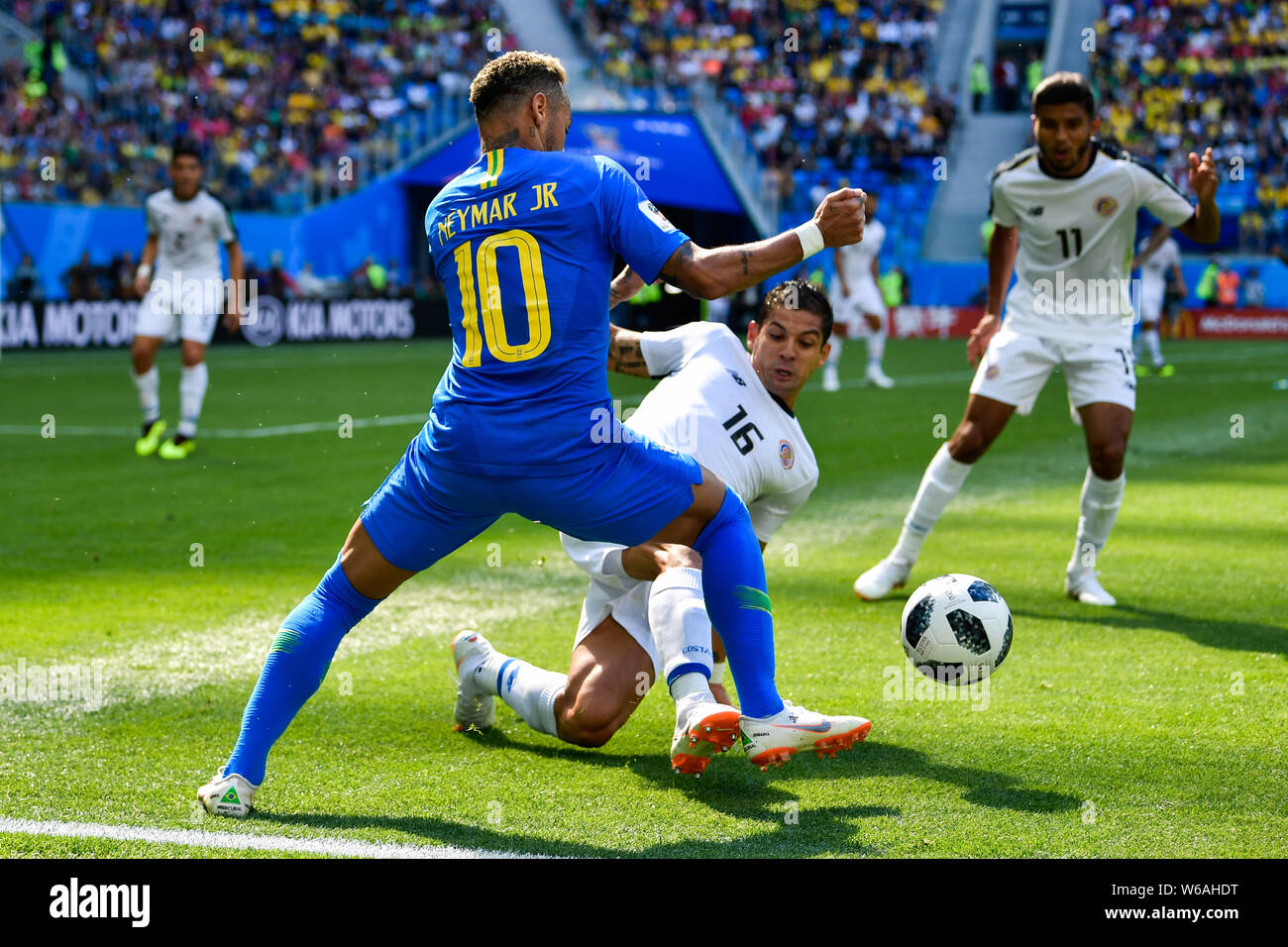 Cristian Gamboa, below, of Costa Rica challenges Neymar of Brazil in their Group E match during the FIFA World Cup 2018 in Saint Petersburg, Russia, 2 Stock Photo