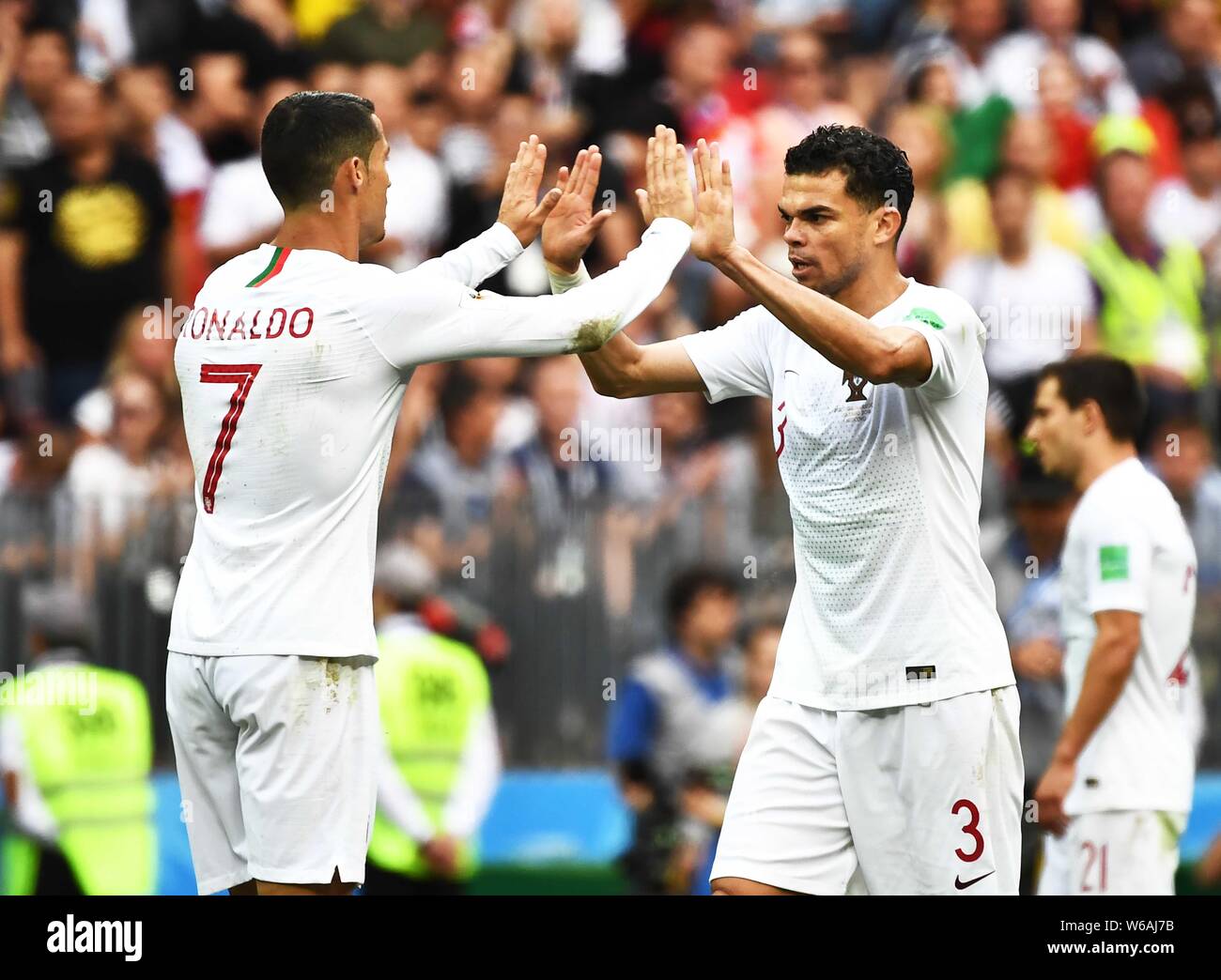 Cristiano Ronaldo of Portugal, left, celebrates with Pepe after defeating Morocco in their Group B match during the 2018 FIFA World Cup in Moscow, Rus Stock Photo