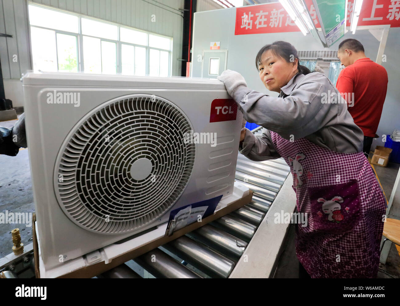 FILEChinese workers manufacture airconditioners on the assembly