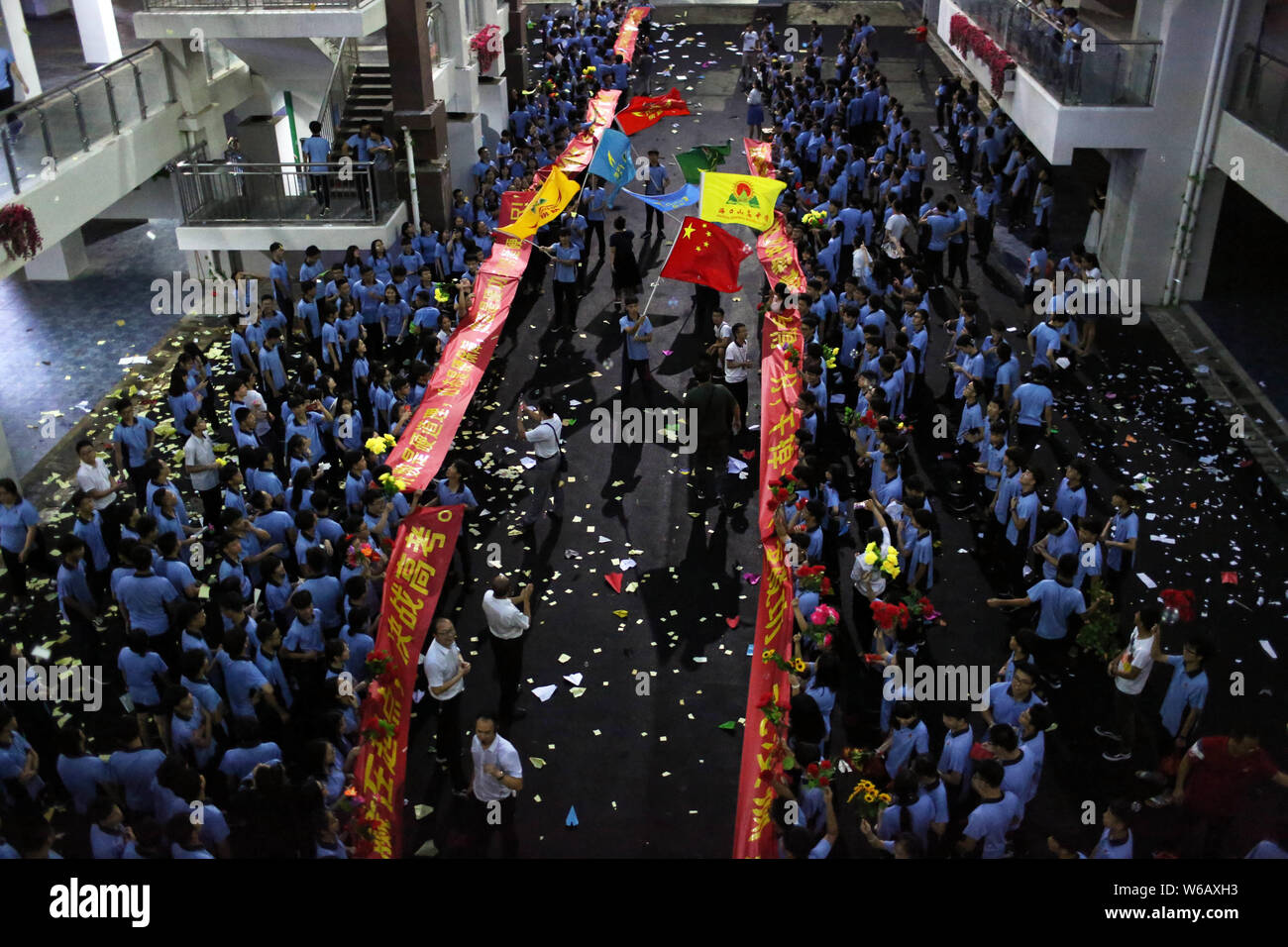 Senior high school students relieve stress by tearing up textbooks ...