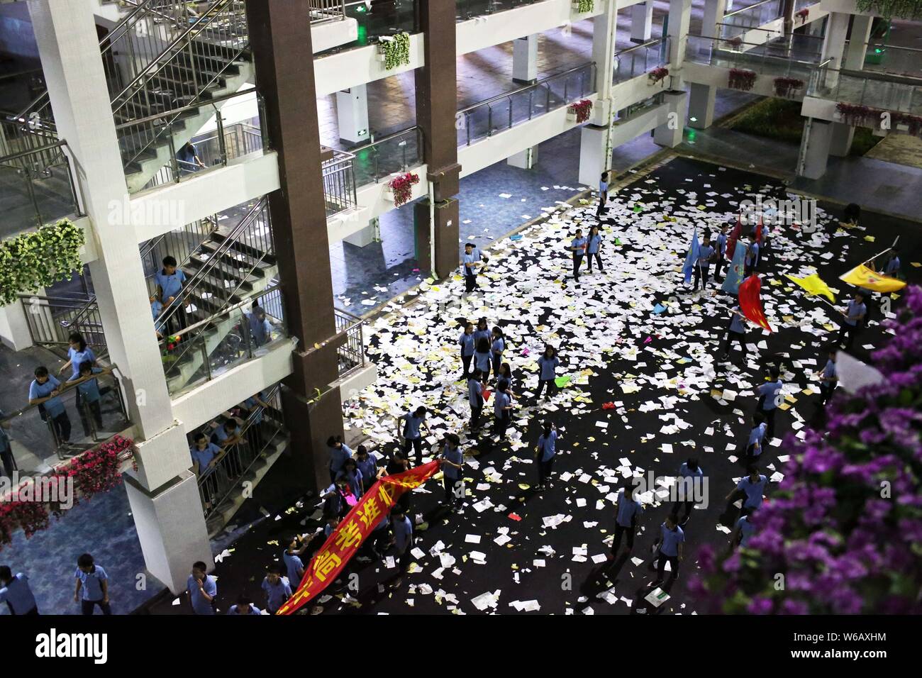 Senior high school students relieve stress by tearing up textbooks ...