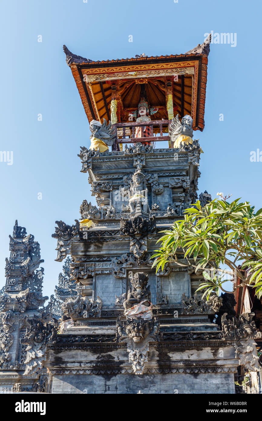 Balinese drum pavilion bale kulkul (bale kul-kul) for a slit-log drum. Lovina, Bali, Indonesia. Vertical image. Stock Photo